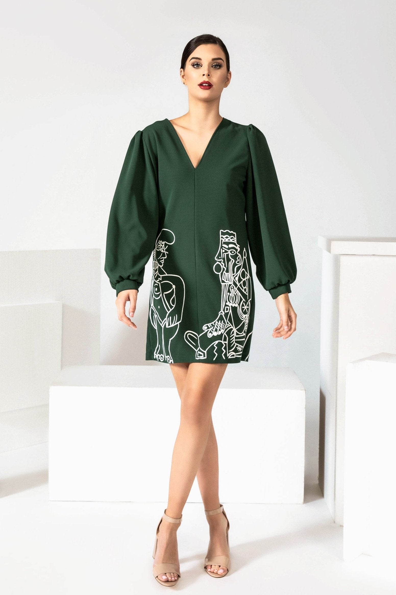 Women hand painted green mini A-line dress displayed on mannequin
