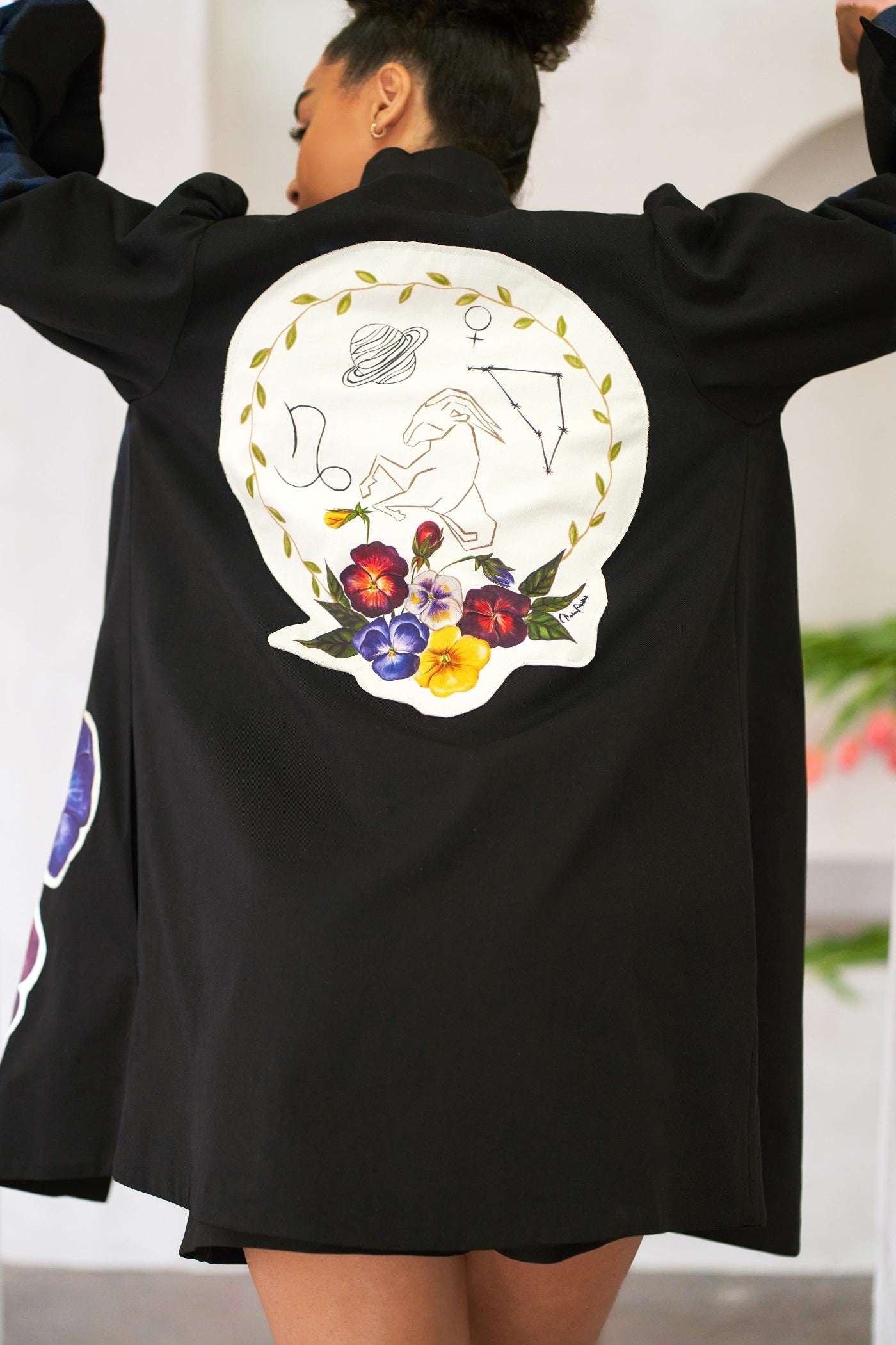 Women Capricorn Zodiac jacket with hand-painted astrological patches and cotton twill fabric