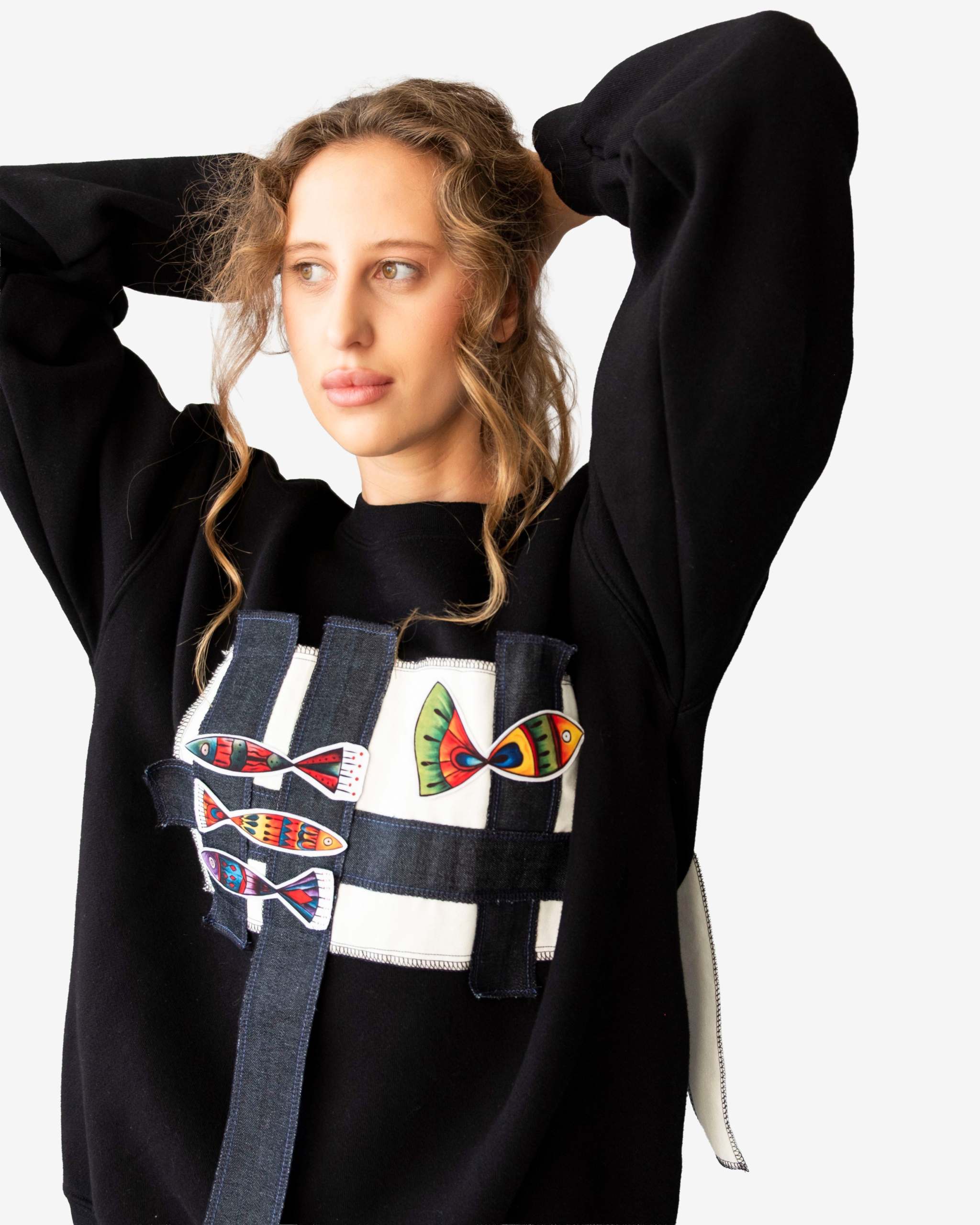 Artisan Fish Patchwork Crewneck with fish motif patchwork and layered textile straps on soft cotton French terry
