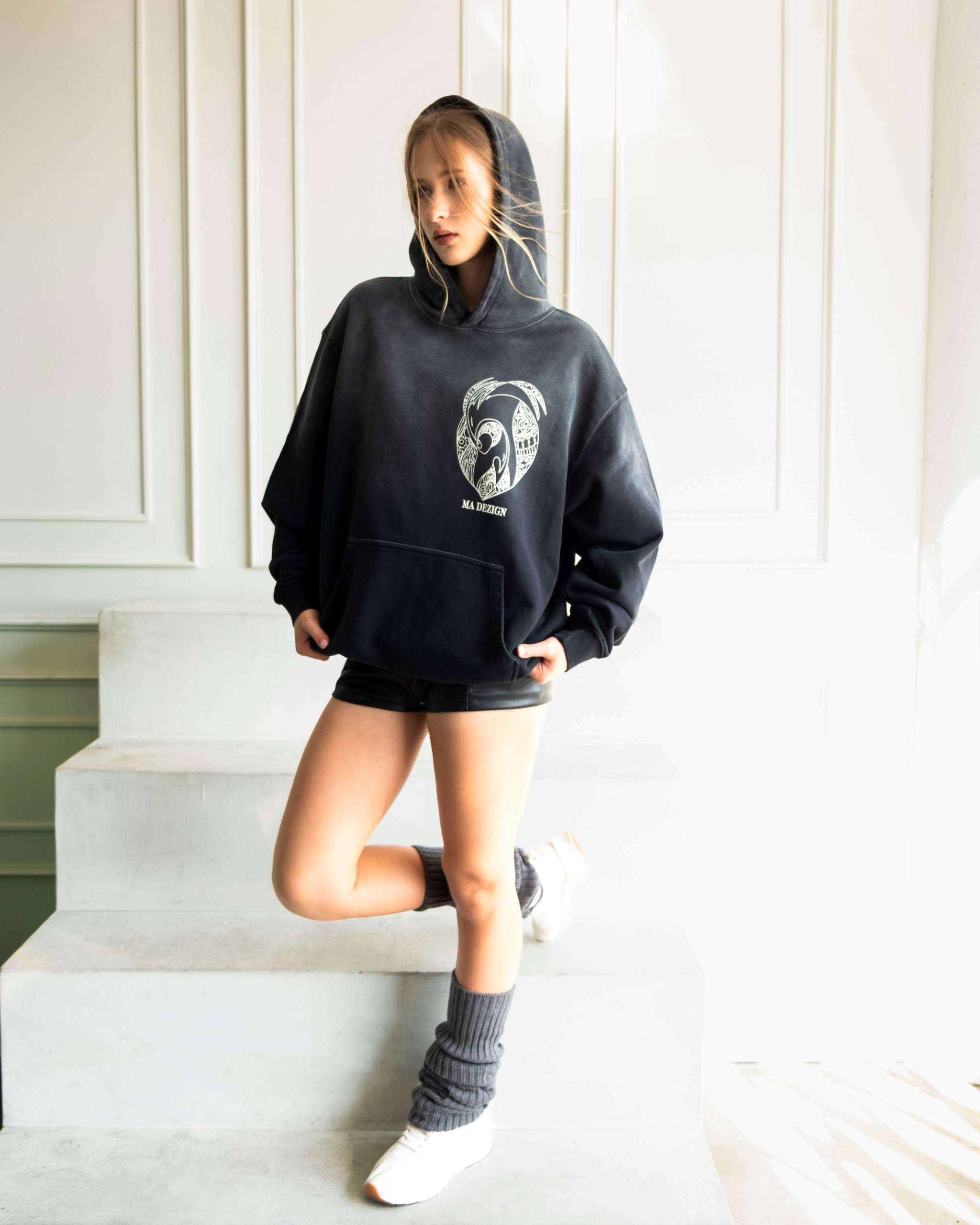 Relaxed sun-faded graphic hoodie made from heavyweight cotton French terry with artistic print and kangaroo pocket, designed in Los Angeles