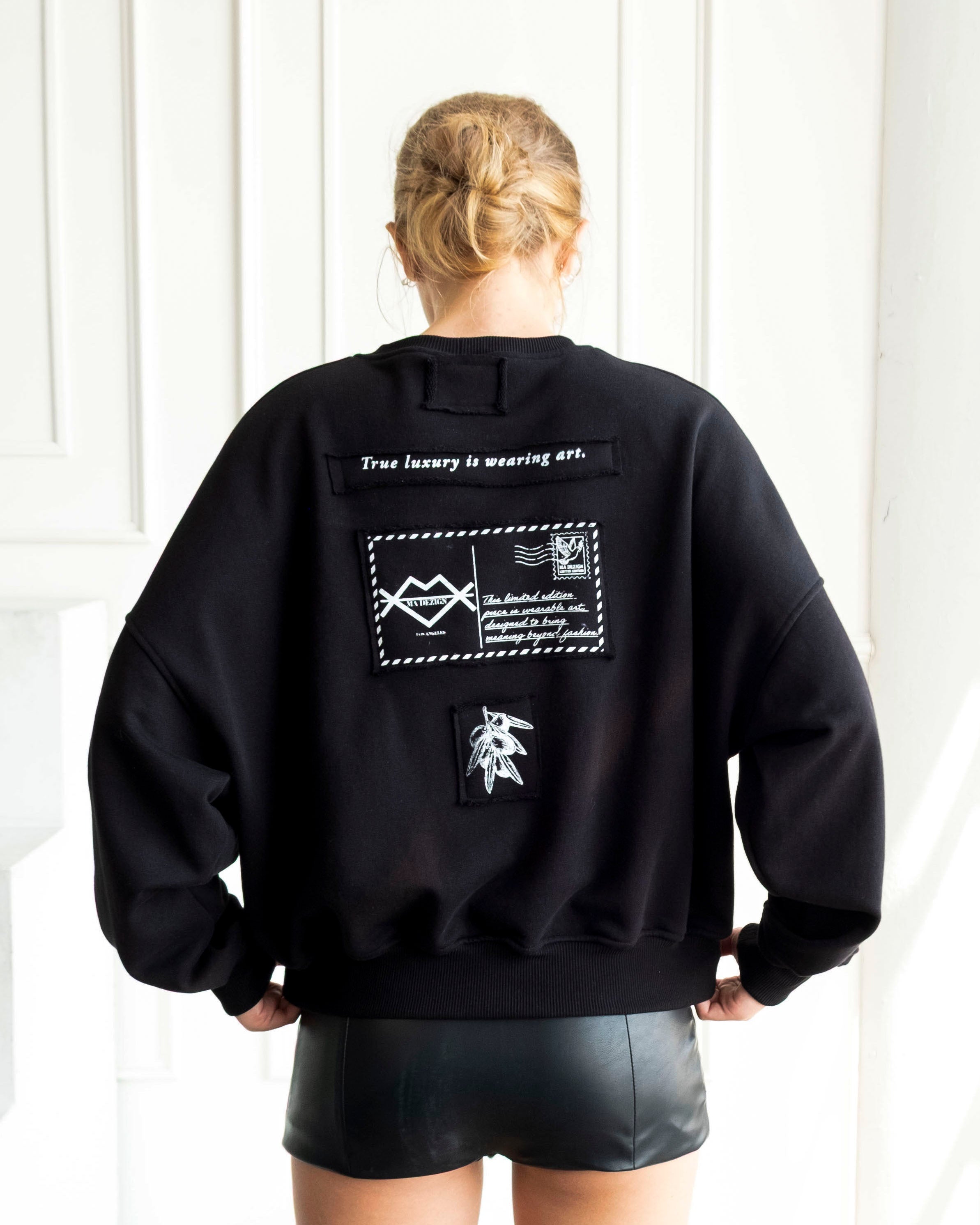 Unity World Cropped Crewneck with peace and Earth patchwork design on 100% cotton French terry fabric
