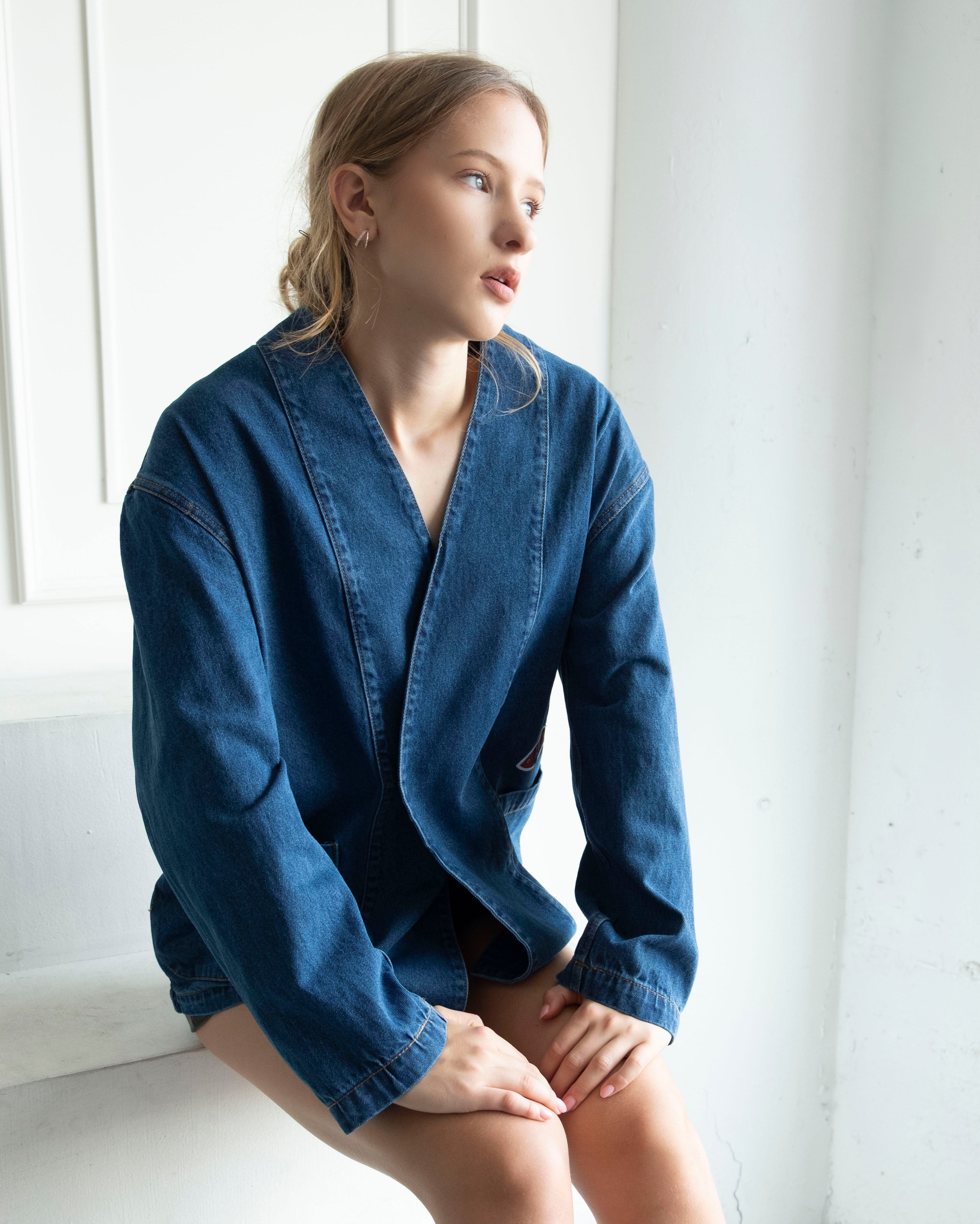 Nomad oversized indigo denim jacket with artistic patchwork and relaxed fit