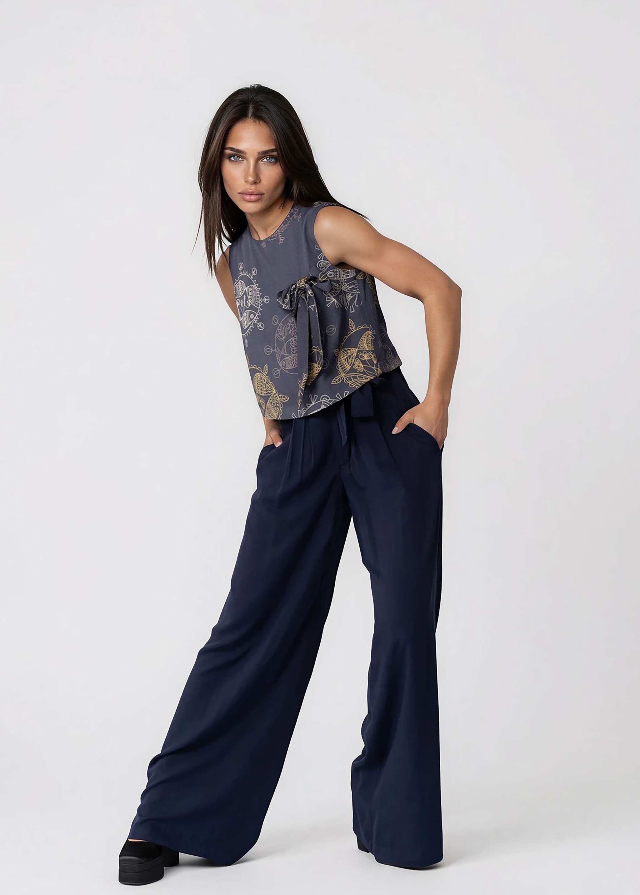 High-waisted wide leg black twill pants with self-tie belt and front pleats