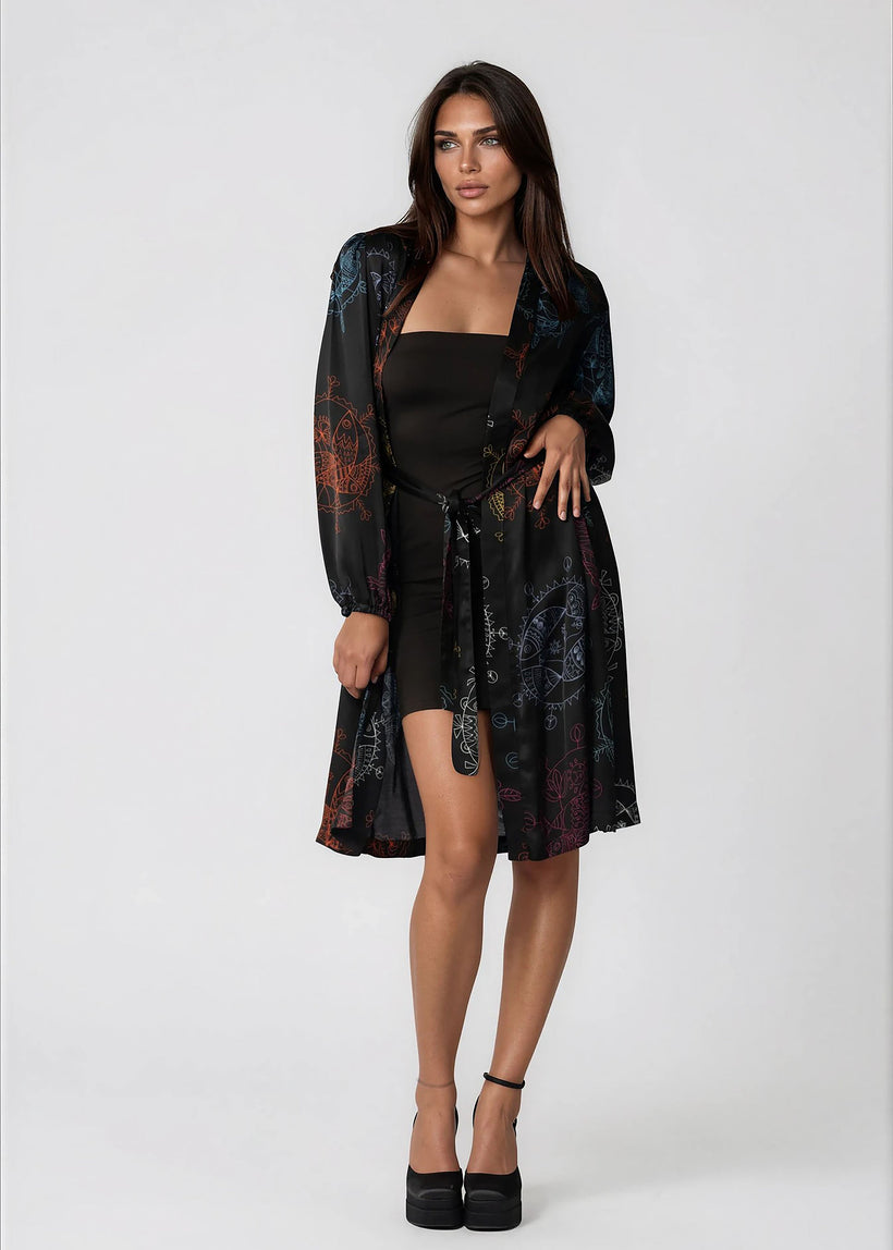 Woman wearing midnight ocean dream women midi kimono robe with shawl collar and bell sleeves