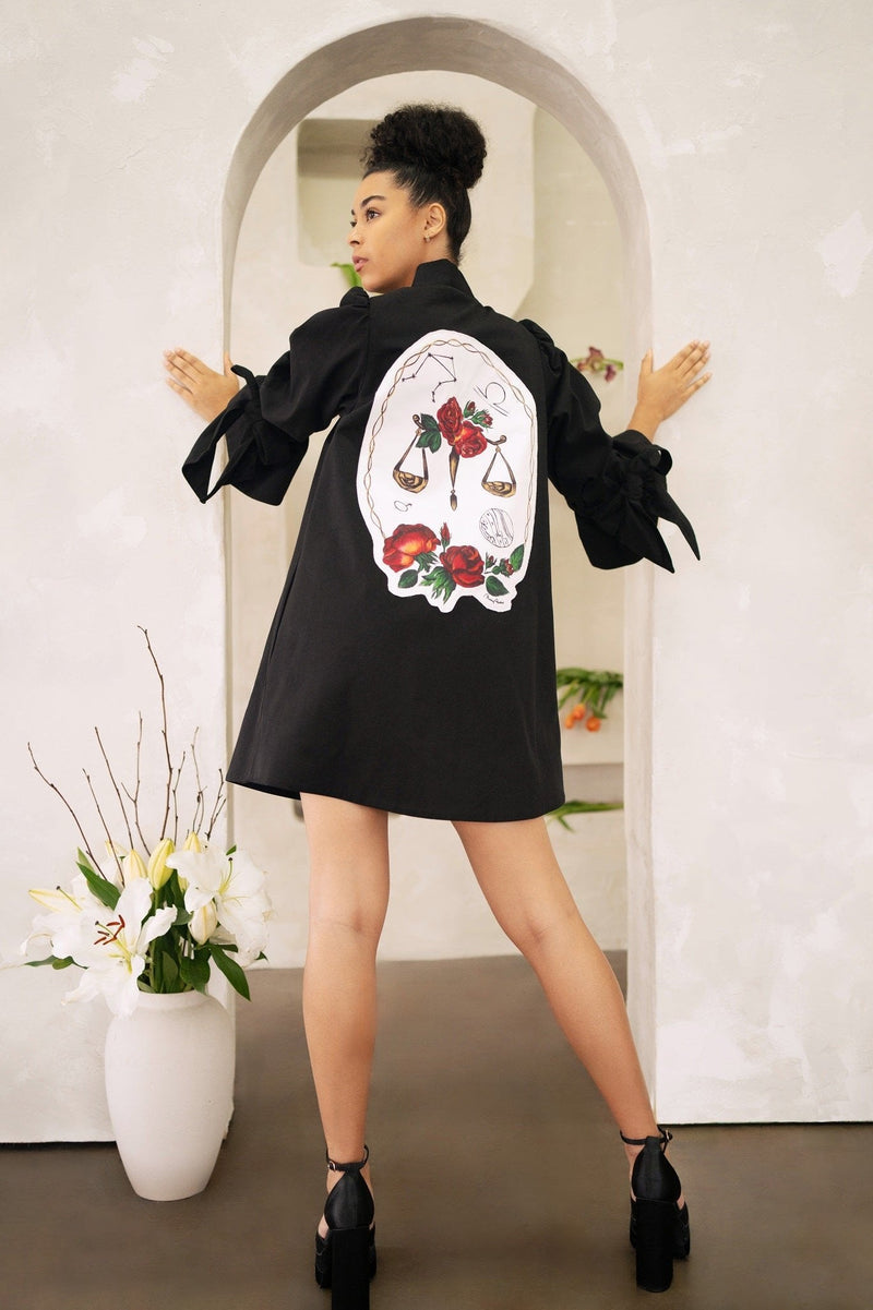 Women wearing a Women Libra Zodiac Jacket with hand-painted zodiac-themed patches and self-tie adjustable sleeve straps