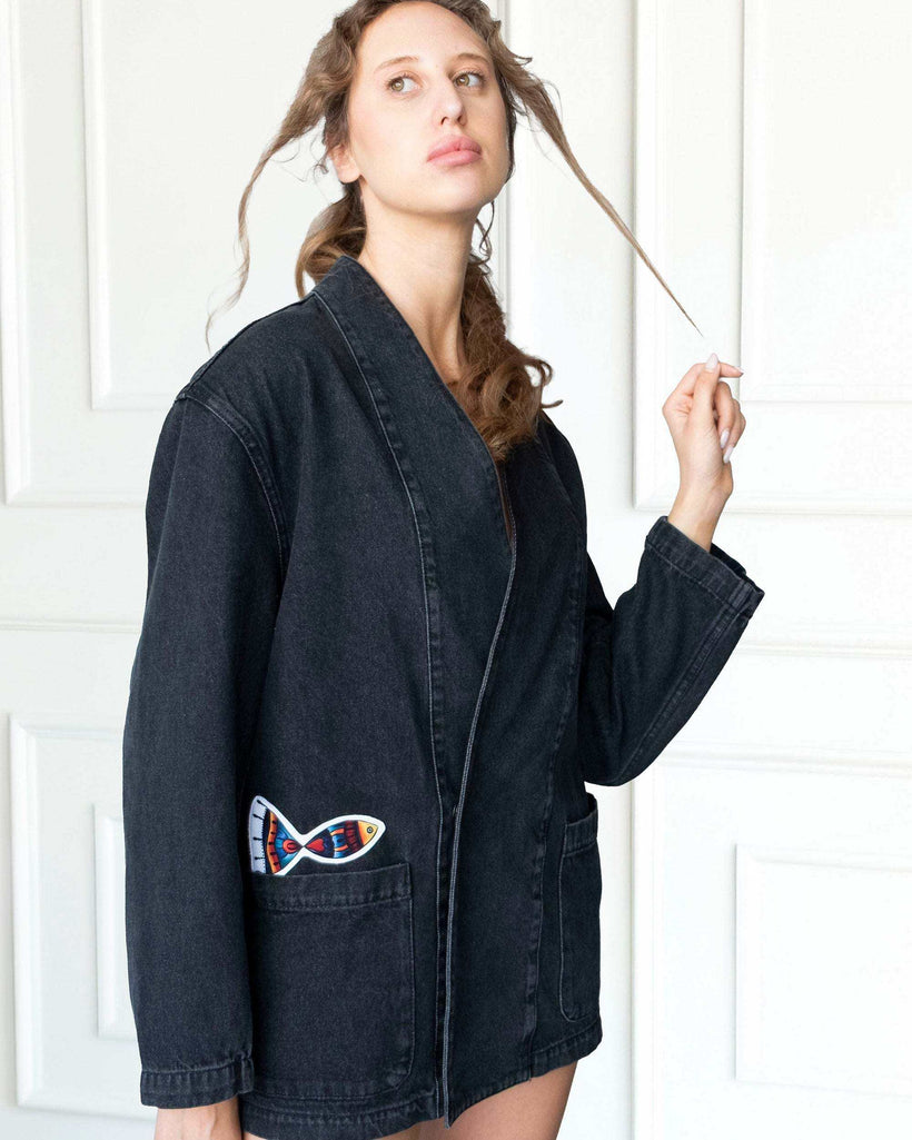 Gray Nomad Oversized Denim Jacket with artistic patchwork and open-front design made from 100% cotton denim