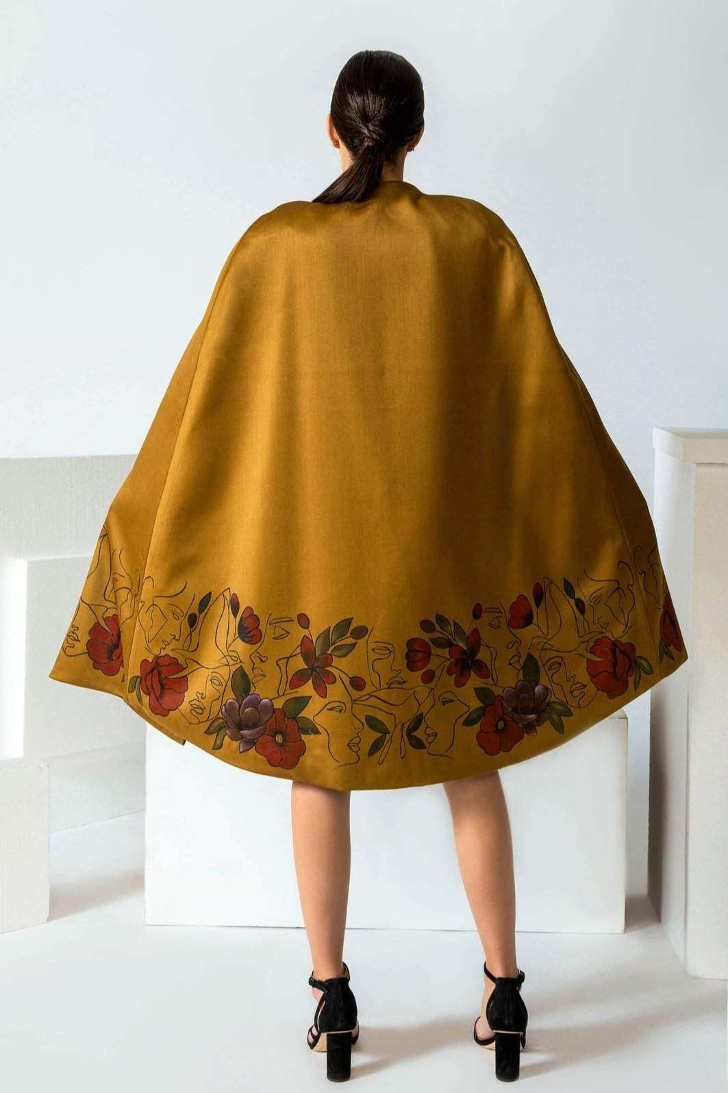 Hand-painted World in Peace silk cape tailored with self-tie strap