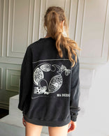 Washed gray cropped hoodie with artistic miniature bird print on 100% cotton French terry fabric