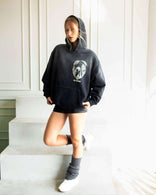 Relaxed sun-faded graphic hoodie made from heavyweight cotton French terry with artistic print and kangaroo pocket, designed in Los Angeles