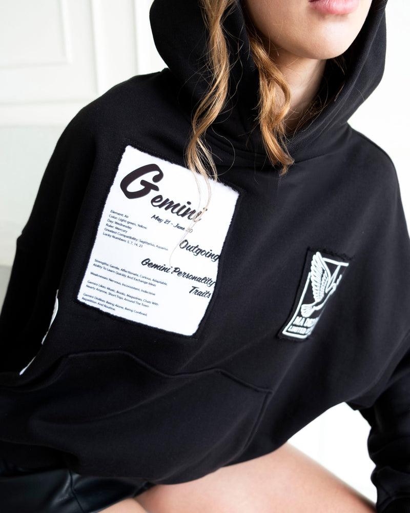 Zodiac Symbols Patchwork Hoodie with twelve zodiac sign motifs on cotton French terry fabric, designed in Los Angeles