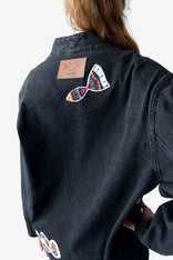 Gray Nomad Oversized Denim Jacket with artistic patchwork and open-front design on cotton denim