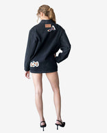Nomad oversized gray denim jacket with artistic patchwork and relaxed fit
