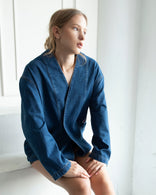 Nomad oversized indigo denim jacket with artistic patchwork and relaxed fit