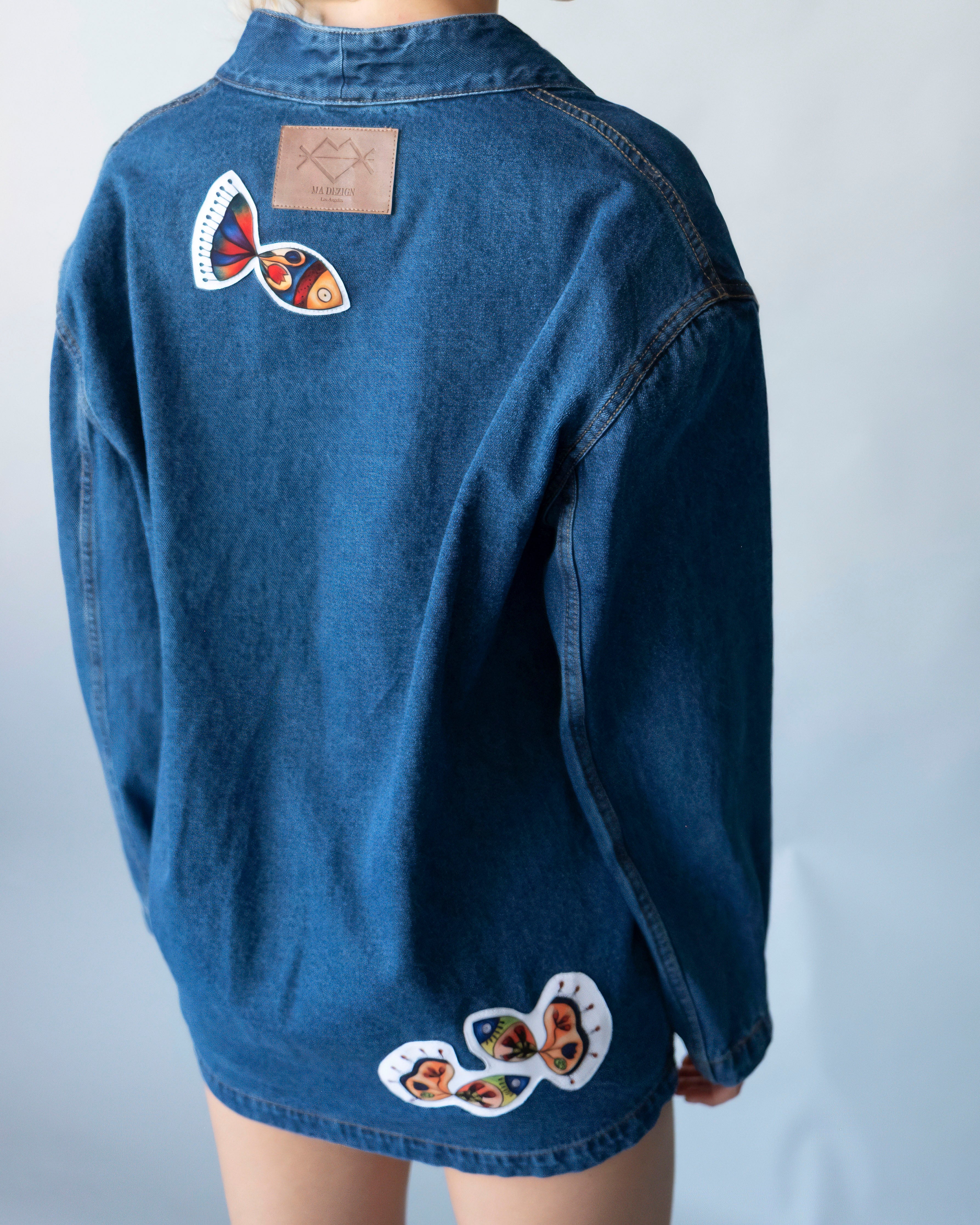 Nomad Oversized Denim Jacket in indigo with artistic patchwork and relaxed fit