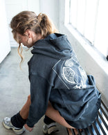 Oversized stone-washed gray hoodie with artistic graphic and front pocket made from heavyweight cotton French terry