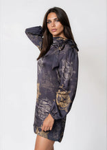 Woman wearing a Twilight Ocean Dream high neck mini dress with long bell sleeves and self-tie neck detail