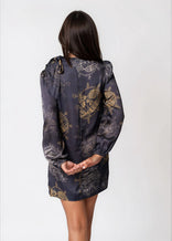 Women wearing Twilight Ocean Dream high neck mini dress with long bell sleeves and self-tie neck detail
