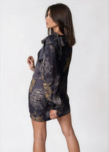 Women wearing Twilight Ocean Dream high neck mini dress with long bell sleeves and self-tie neck detail