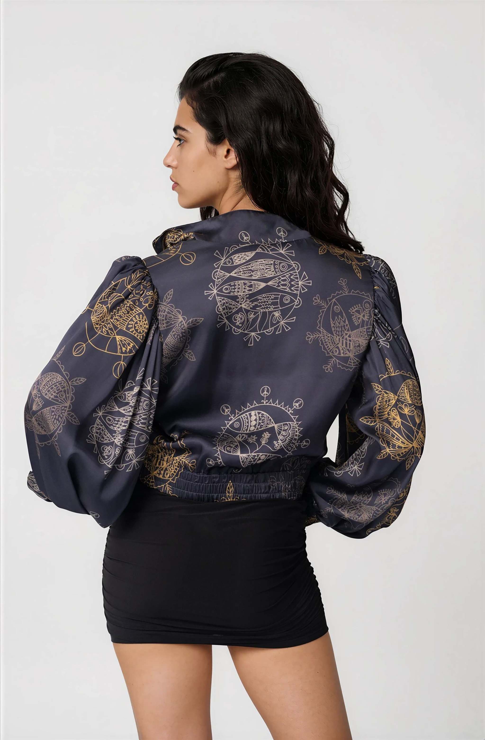 Women's cropped bomber jacket with oversized bell sleeves and front zipper in Twilight Ocean Dream pattern