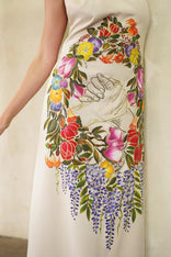Hand-painted Unity Garden dress in silk sateen, A-line maxi style with high neck, symbolizing unity and harmony.