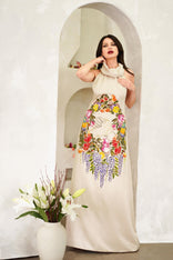 Hand painted Unity Garden dress in silk sateen with high neck and A-line style displayed on model