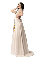Woman wearing hand-painted Unity Garden dress maxi A-line silk sateen design