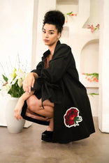 Women wearing a Women Libra Zodiac Jacket with hand-painted astrology symbols on a flared cotton twill swing coat