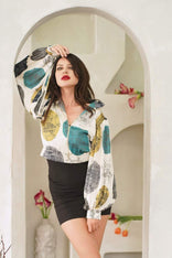 Cropped bomber jacket for women with oversized bell sleeves and front zipper in daylight ocean dream pattern