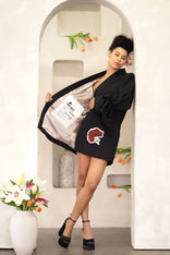Women wearing a hand-painted Scorpio zodiac jacket with constellation and astrological symbols on cotton twill fabric