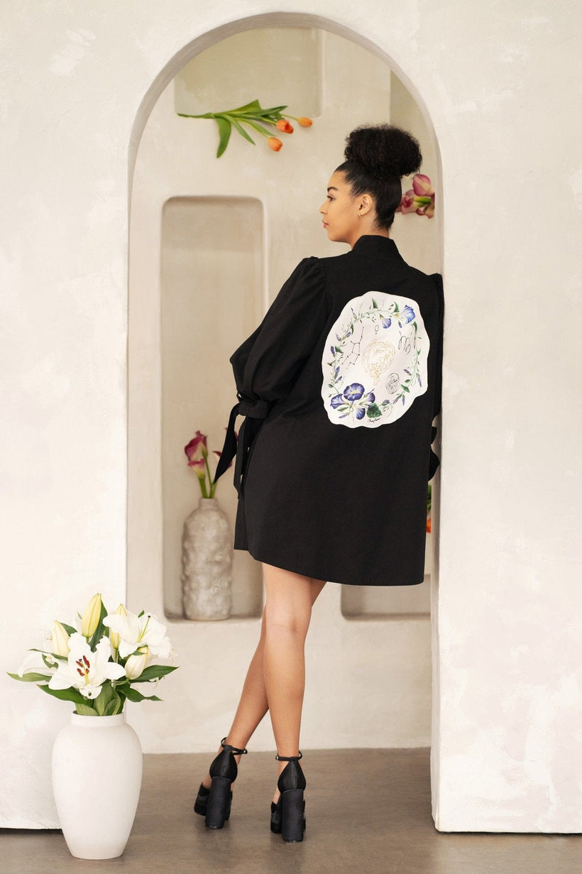 Women wearing Virgo Zodiac jacket with hand-painted astrology symbols and constellation stars on cotton twill fabric