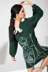 Women hand painted green mini A-line dress on mannequin in LA studio