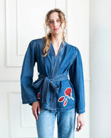 Red Peony Wrap Denim Jacket with artistic floral patchwork and adjustable tie in washed cotton denim