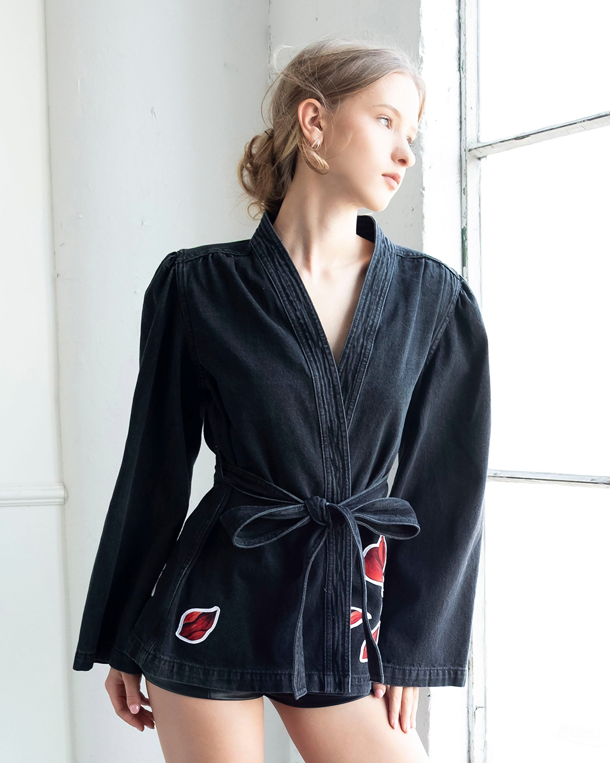 Gray wrap-front denim jacket with red peony patchwork and adjustable tie