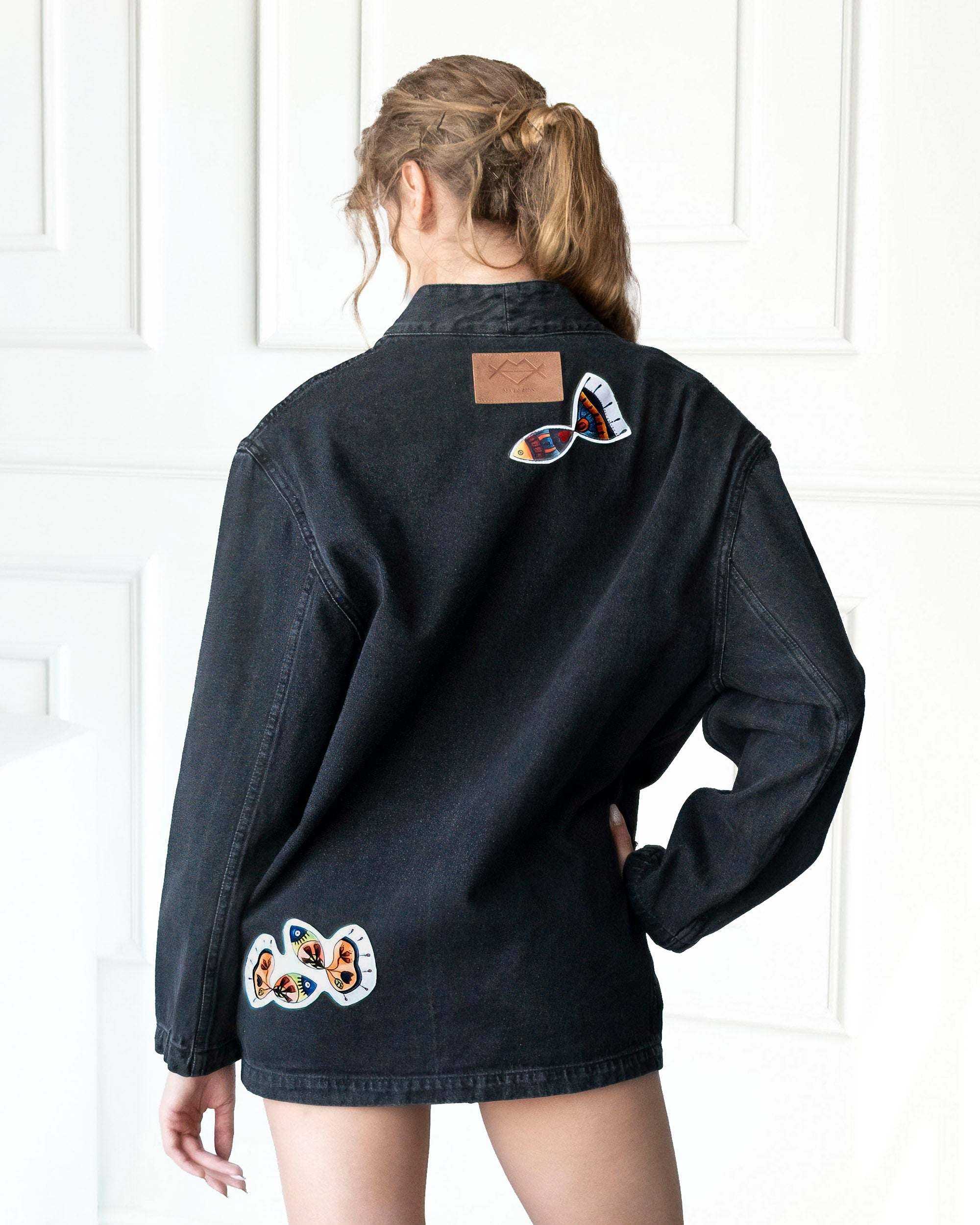 Gray Nomad oversized denim jacket with artistic patchwork, open-front design, and relaxed fit made from 100% cotton denim in Los Angeles