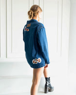 Nomad Oversized Denim Jacket in indigo with artistic patchwork and relaxed fit made from 100% cotton denim