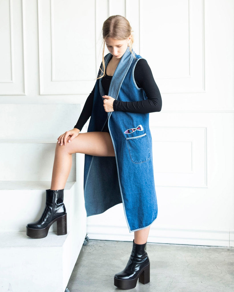 Nomadic Flow Denim Vest Indigo longline sleeveless cotton denim coat with artistic patchwork and open front design