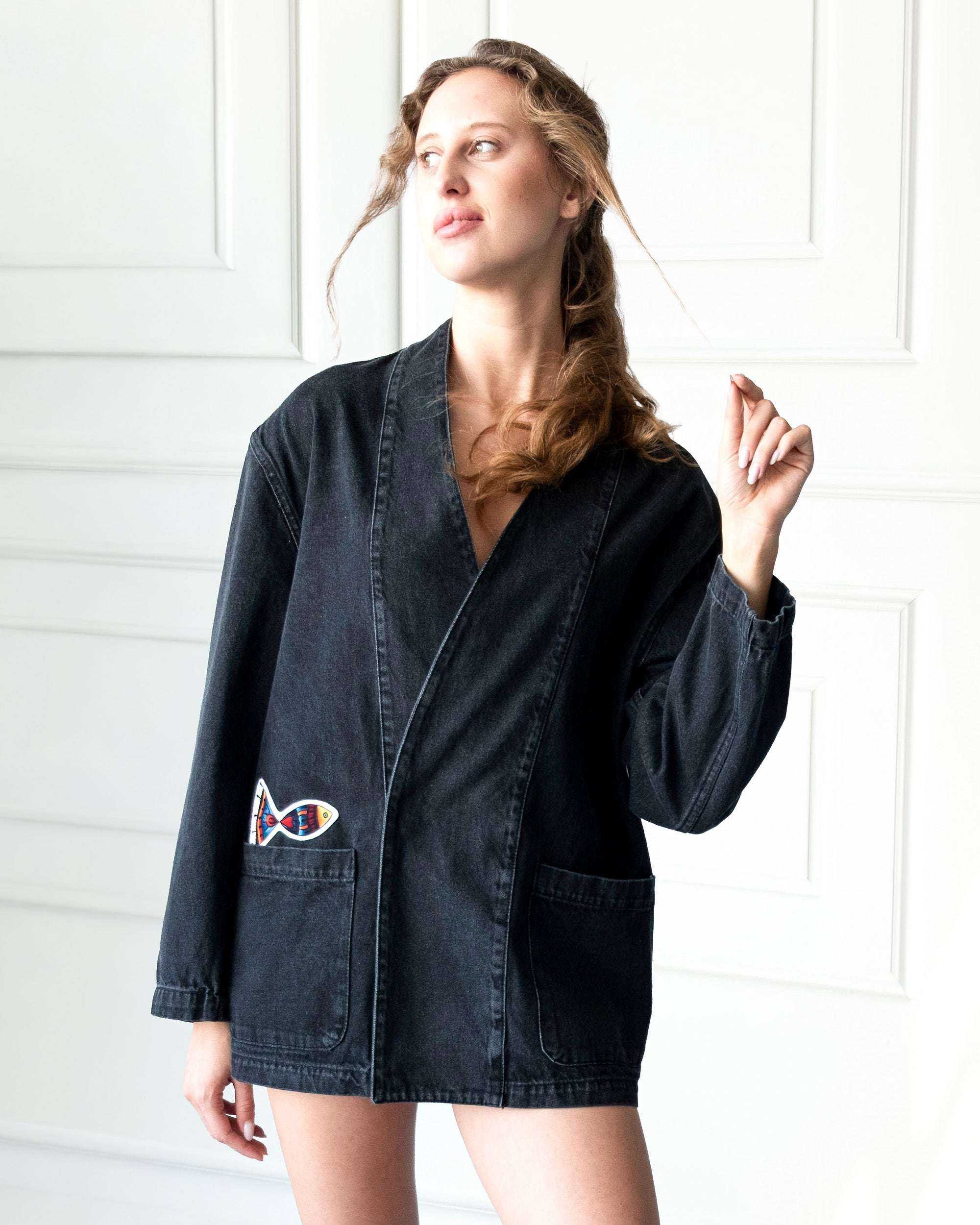Gray Nomad oversized denim jacket with artistic patchwork and open-front design made of 100% cotton denim