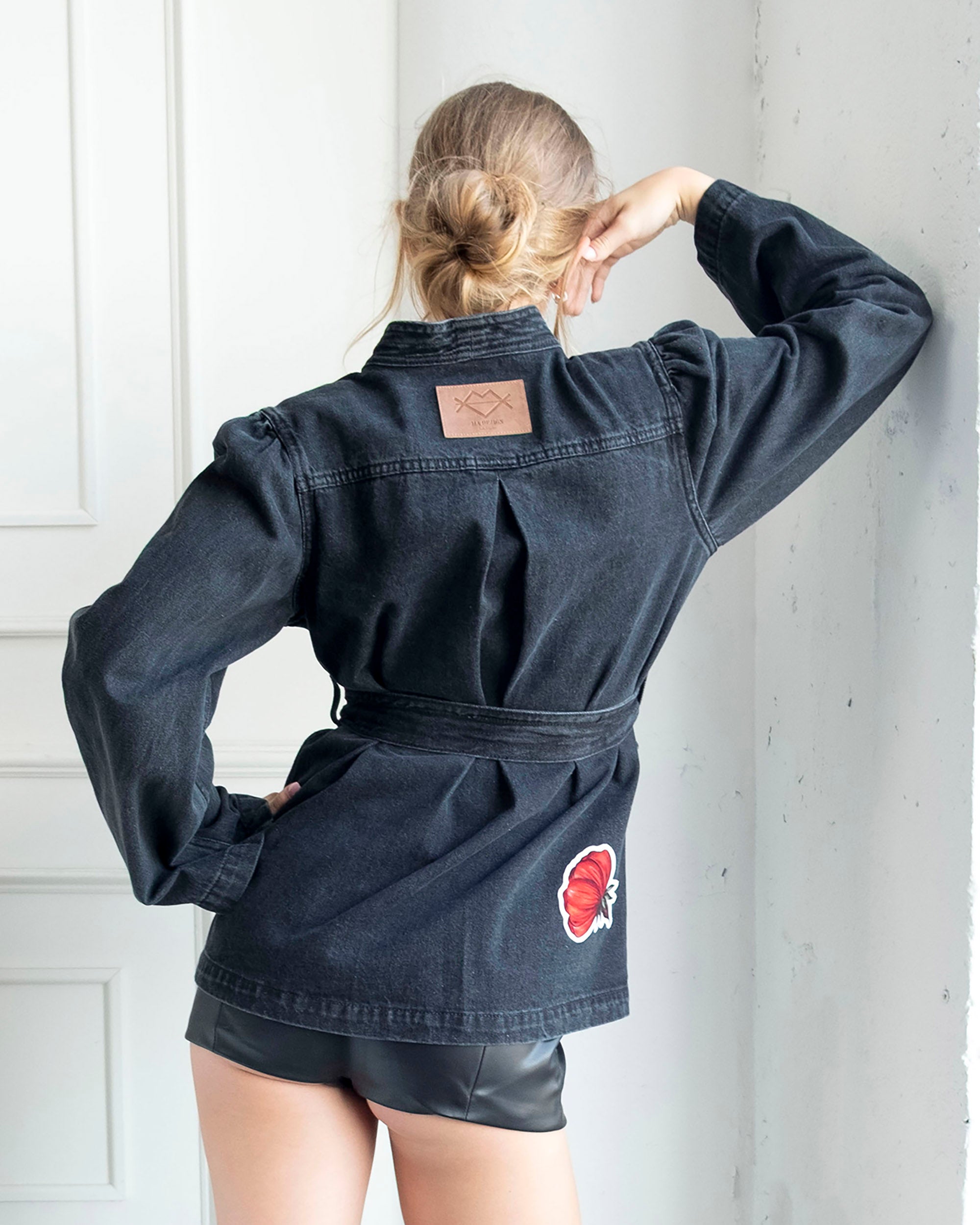 Gray wrap-front denim jacket with red peony patchwork and adjustable waist tie