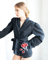 Gray wrap-front denim jacket with red peony patchwork and adjustable tie