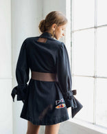 Gray Atelier Flare Denim Jacket with flared silhouette and patchwork details made from 100% washed cotton denim