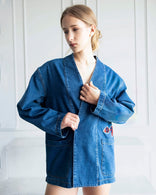 Indigo Nomad Oversized Denim Jacket with artistic patchwork and relaxed open-front design made of 100% cotton denim